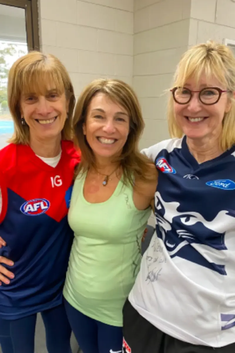 Three smiling Bayside Pickleball Club members at a club gathering