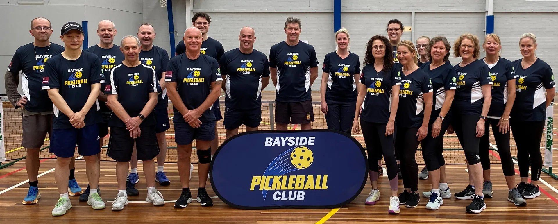 Pickleball players sharing a moment on court